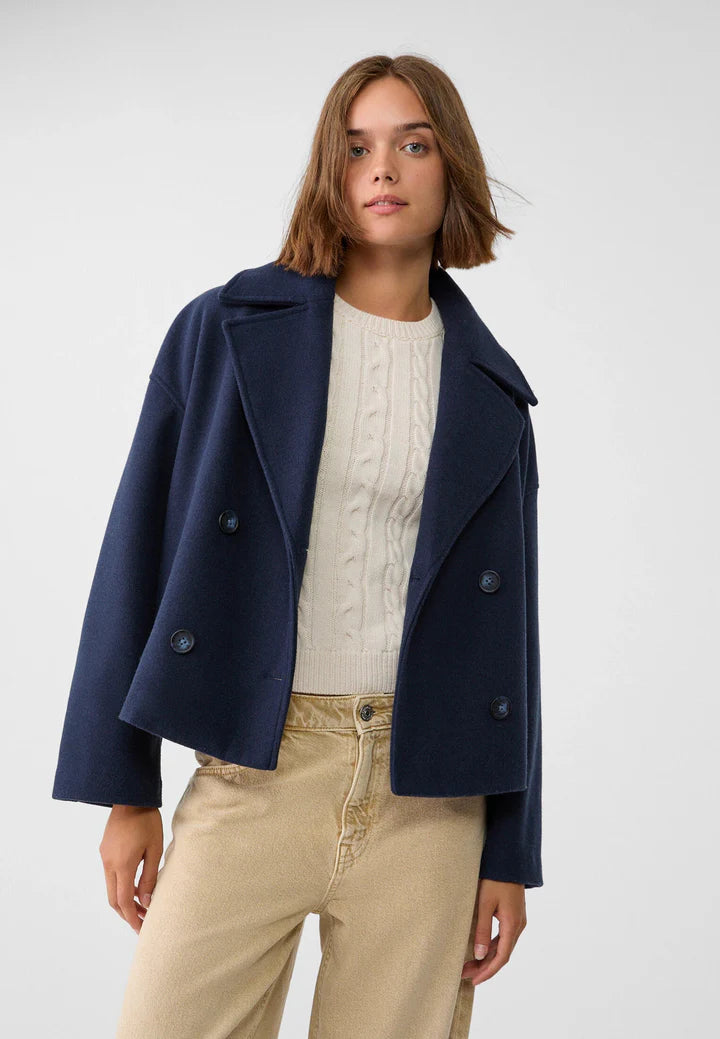 Veste chic courte à double boutonnage pour femme