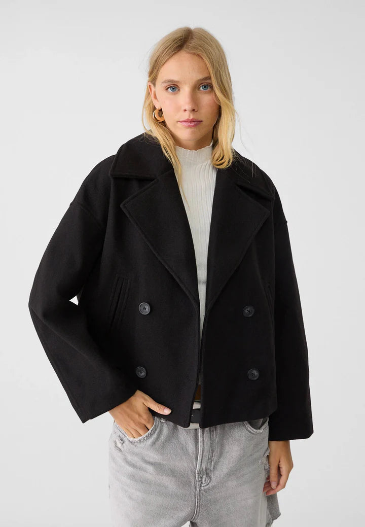 Veste chic courte à double boutonnage pour femme