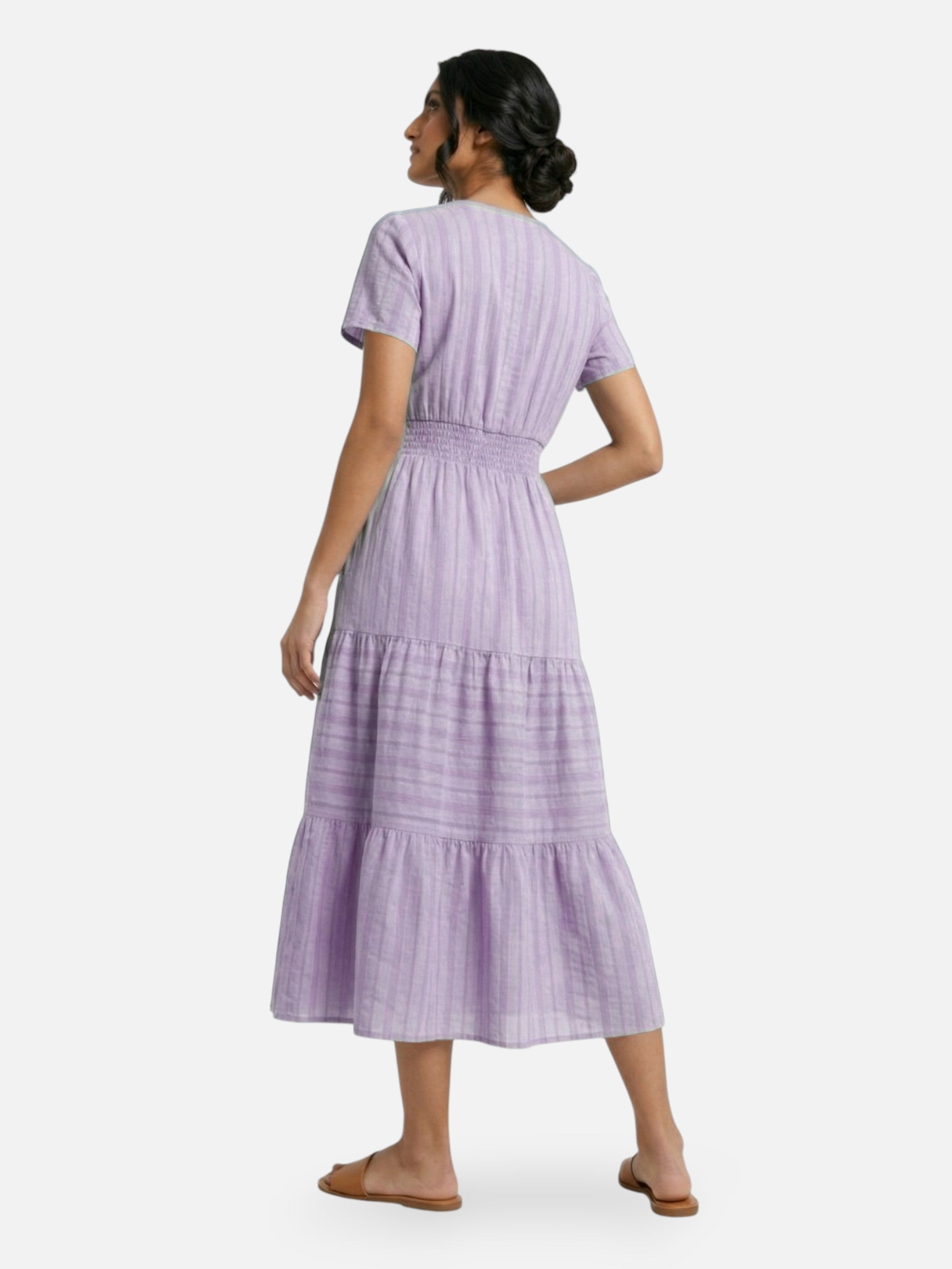 Long flowing women's dress with smocked waist, elegant summer style