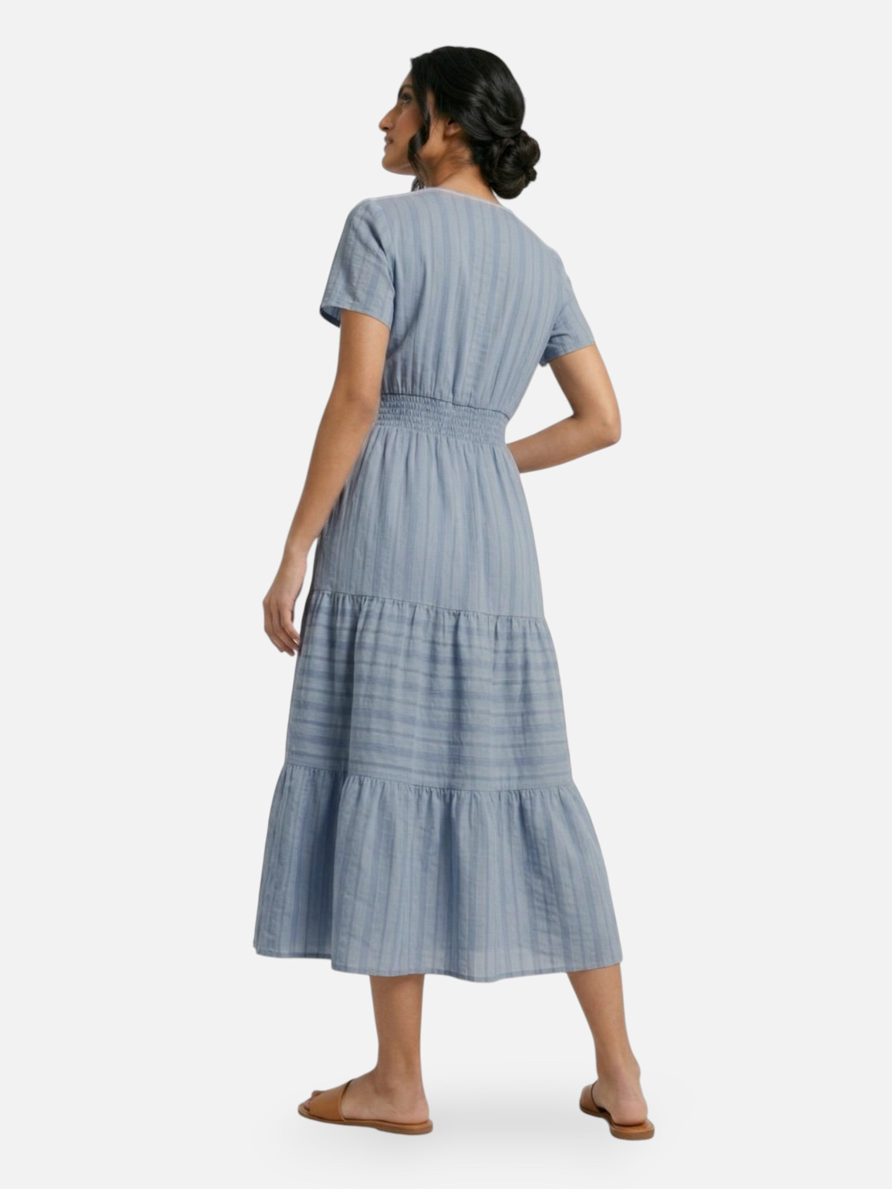 Long flowing women's dress with smocked waist, elegant summer style