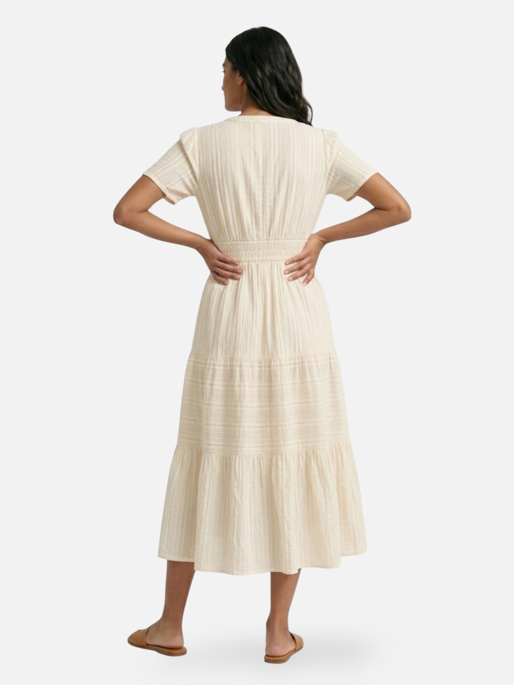 Long flowing women's dress with smocked waist, elegant summer style