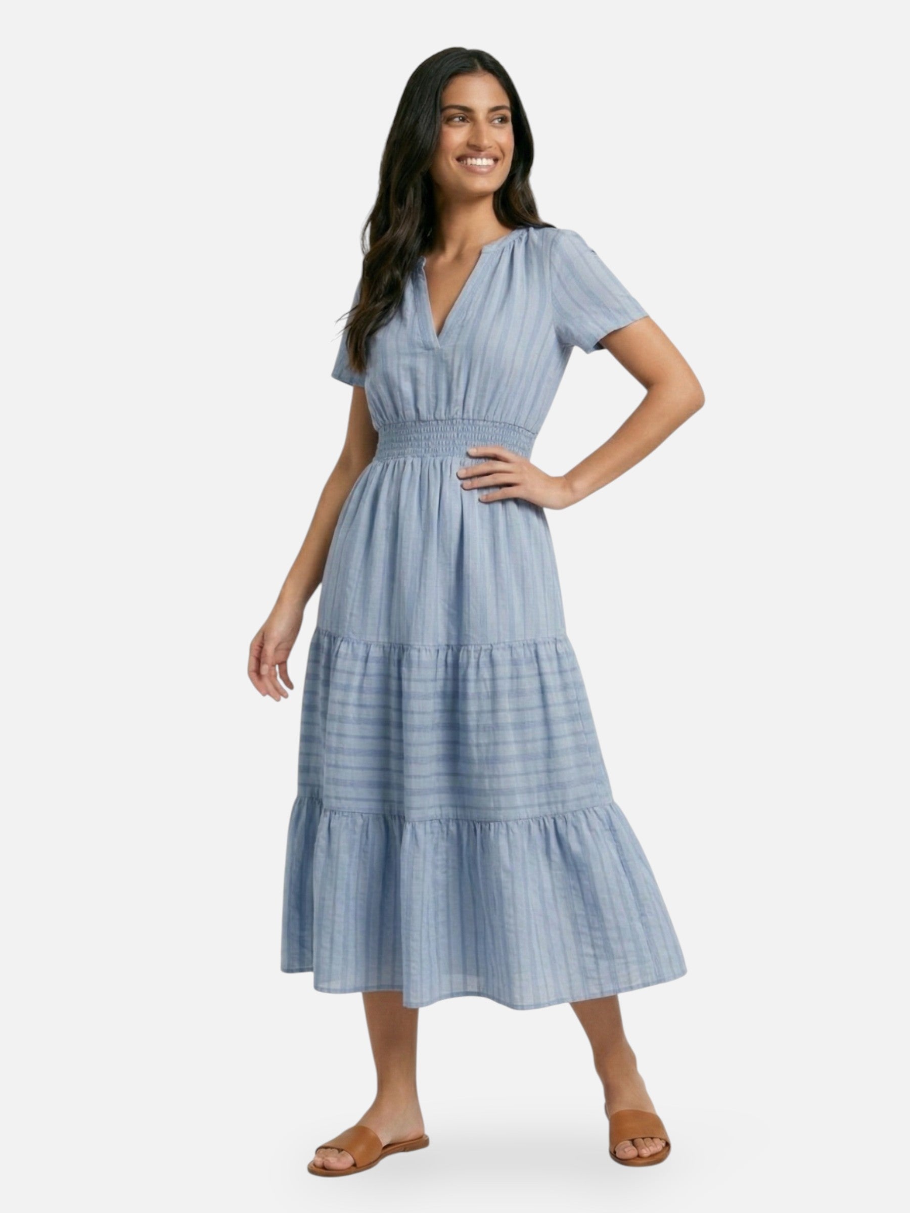 Long flowing women's dress with smocked waist, elegant summer style