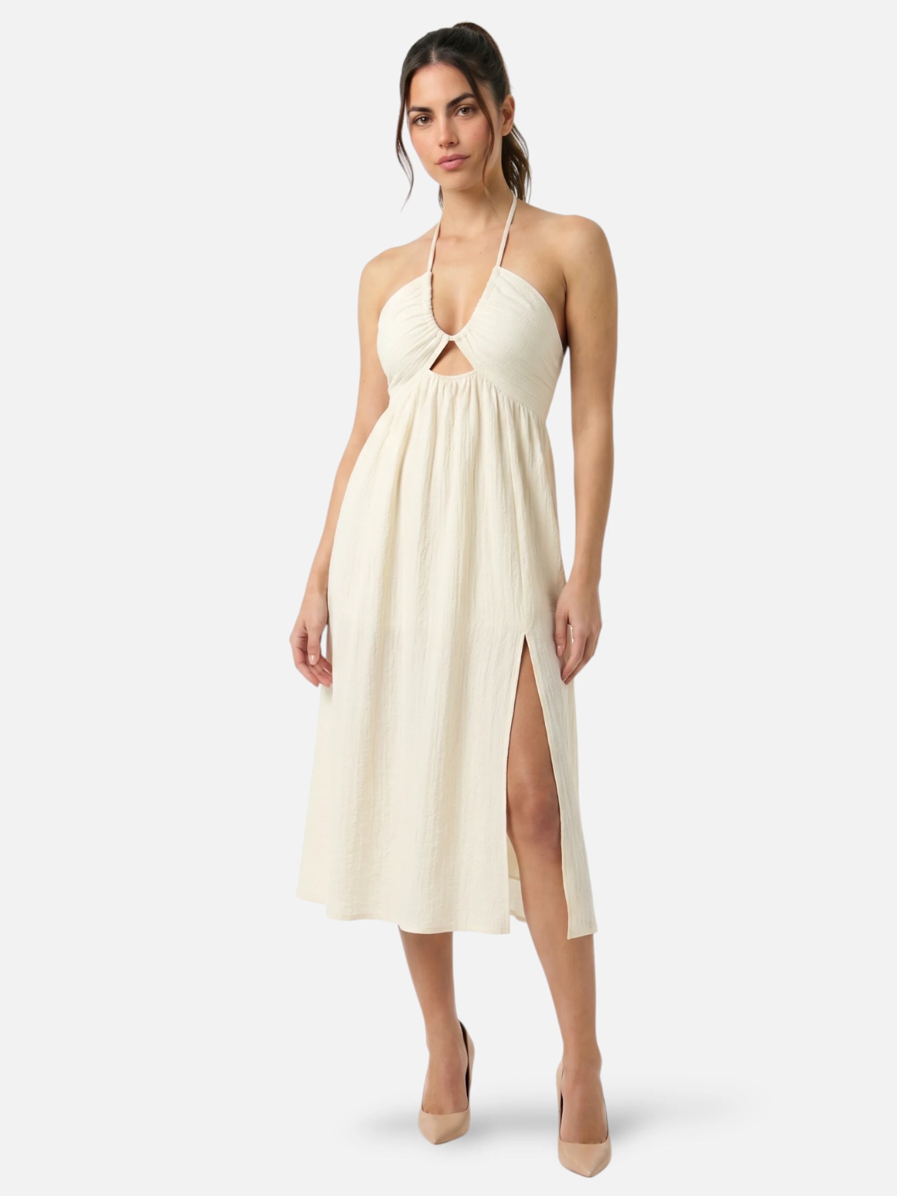 Cream halter midi dress with open back, cutouts, and side slit