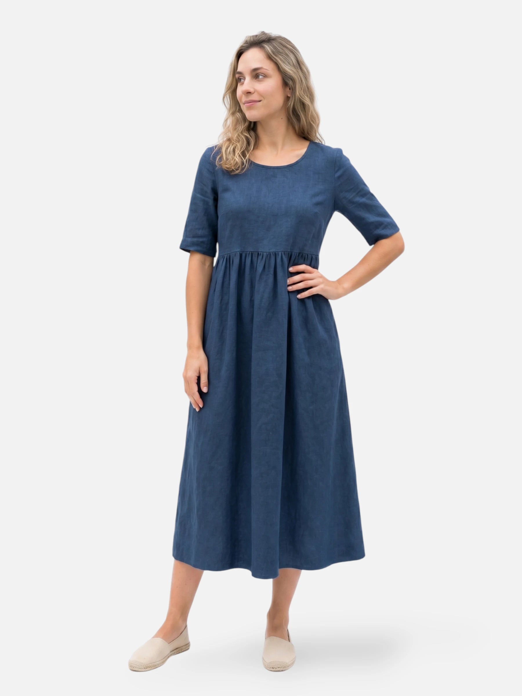 Loose midi dress in mixed linen with short sleeves and pockets