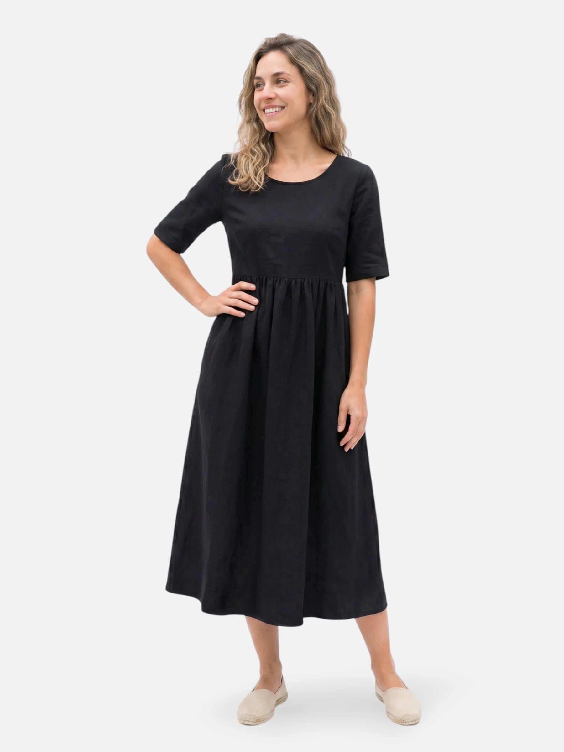 Loose midi dress in mixed linen with short sleeves and pockets