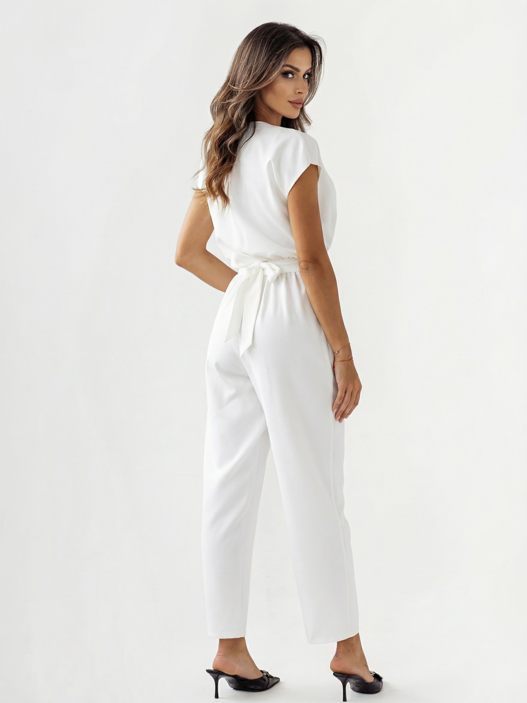 Elegant chic women's jumpsuit – flowy pants with defined waist