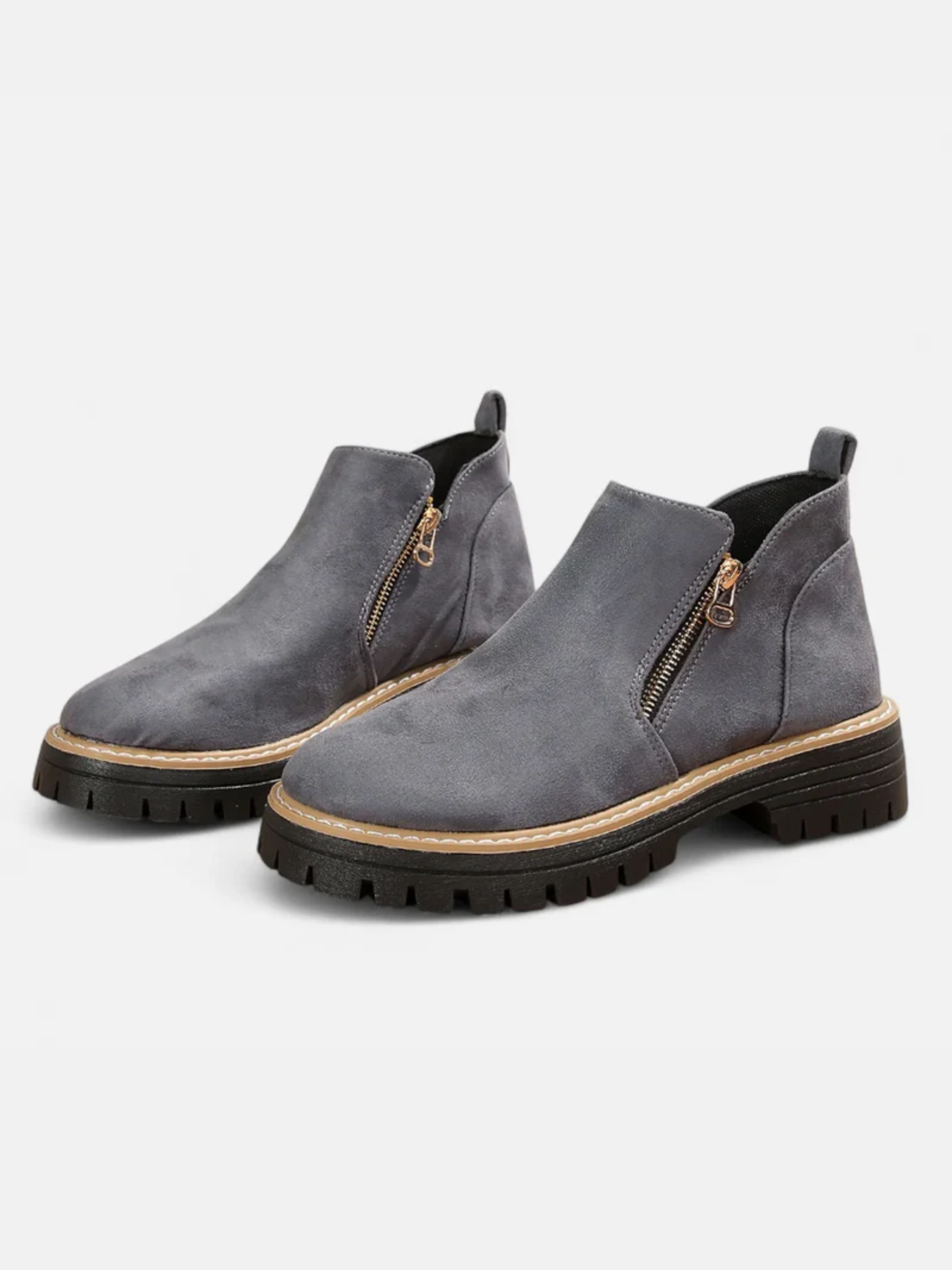 Bottines à semelle crantée avec zip latéral pour femme