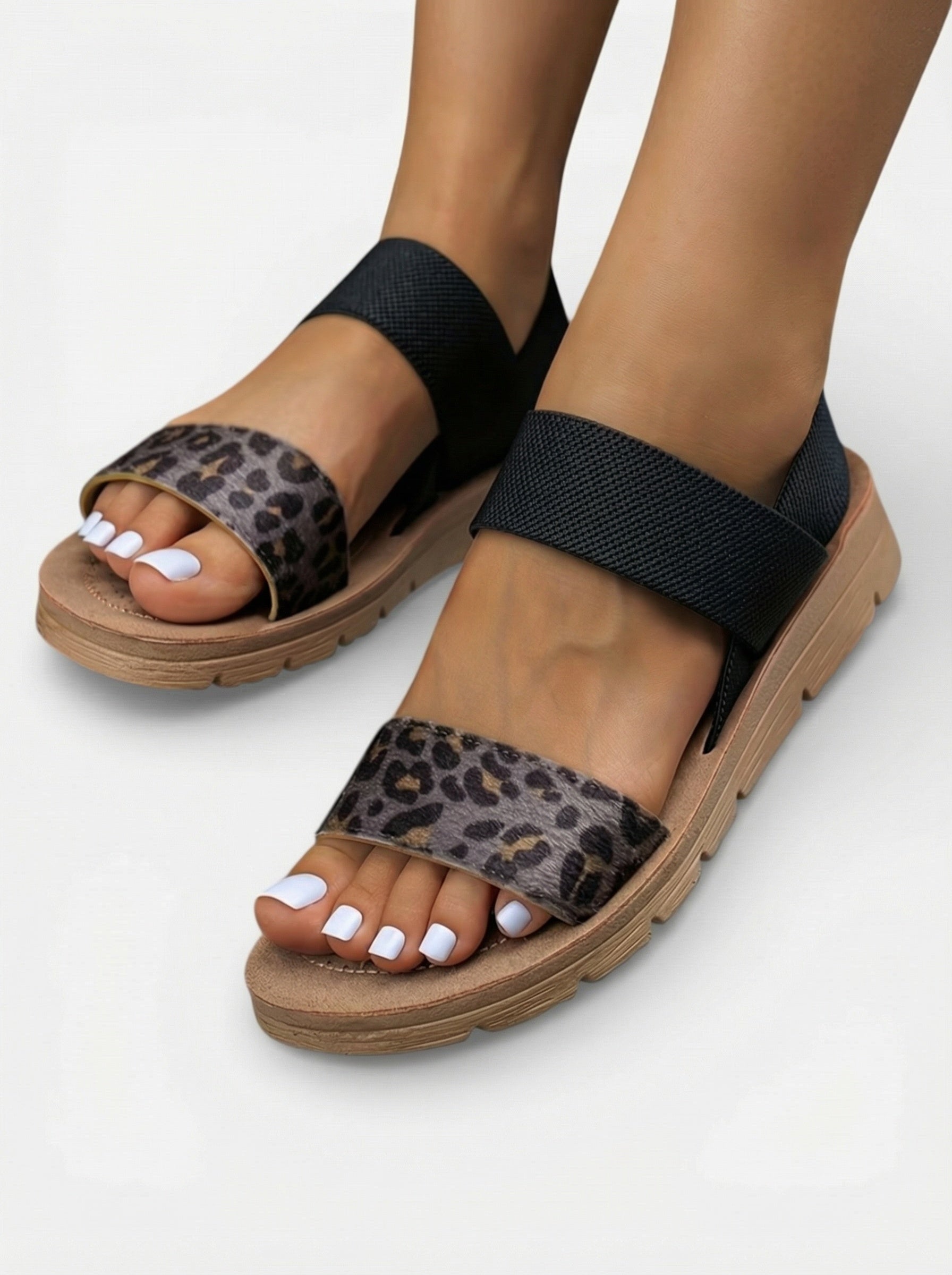 Sandales plates avec imprimé léopard et brides croisées pour femme