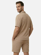 Conjunto de polo y pantalones cortos texturizados de manga corta para hombre
