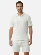 Conjunto de polo y pantalones cortos texturizados de manga corta para hombre