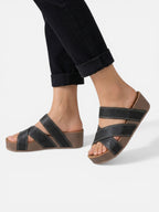 Comfortable wedge sandals for women with crossed straps and leather effect
