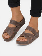Comfortable wedge sandals for women with crossed straps and leather effect