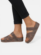 Comfortable wedge sandals for women with crossed straps and leather effect