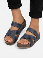 Comfortable wedge sandals for women with crossed straps and leather effect