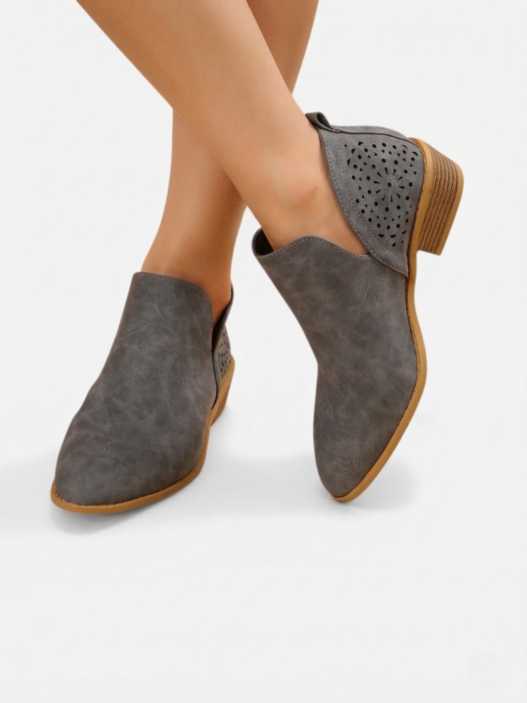 Women's perforated ankle boots with low heel, comfortable western style