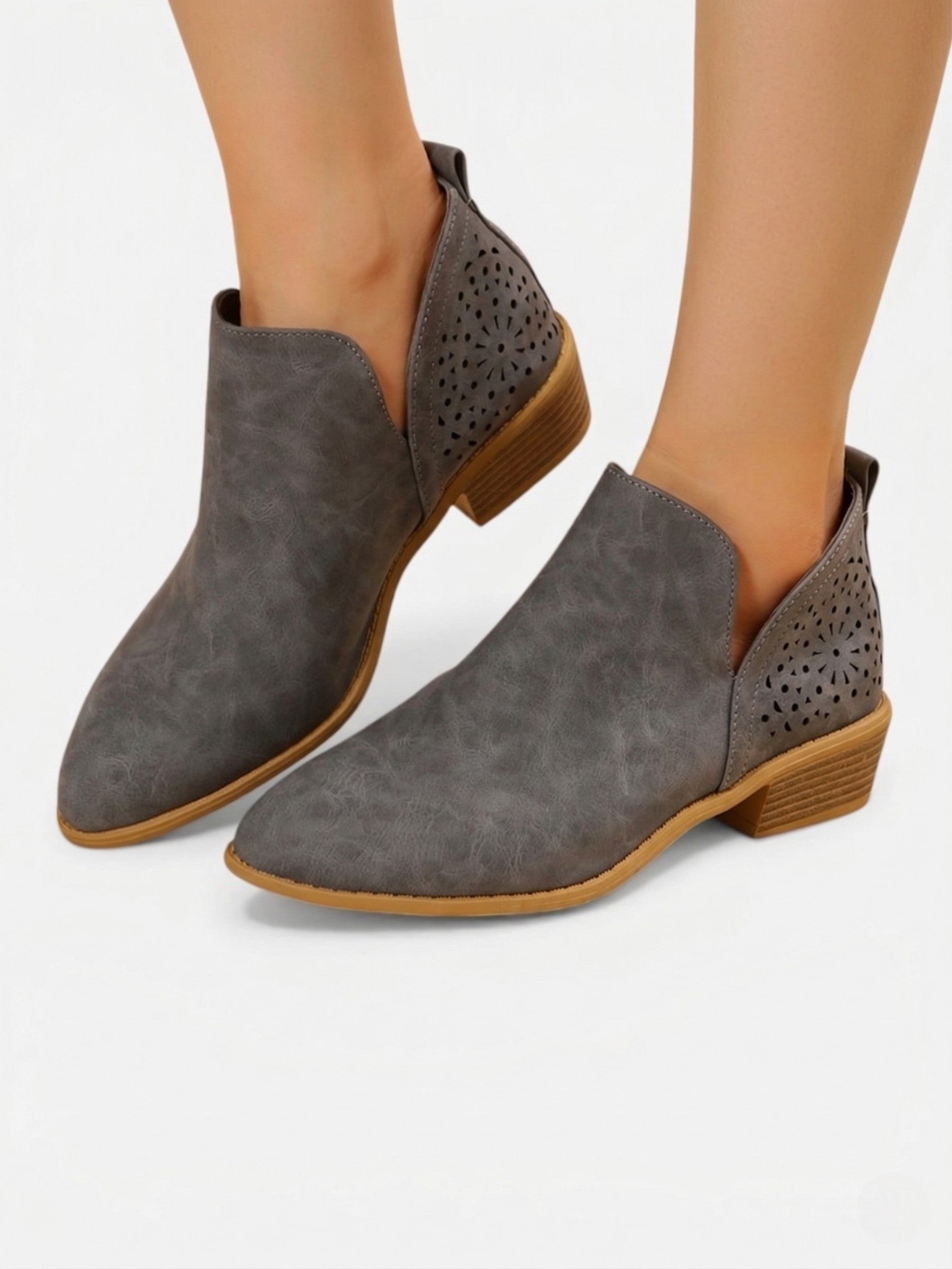 Women's perforated ankle boots with low heel, comfortable western style
