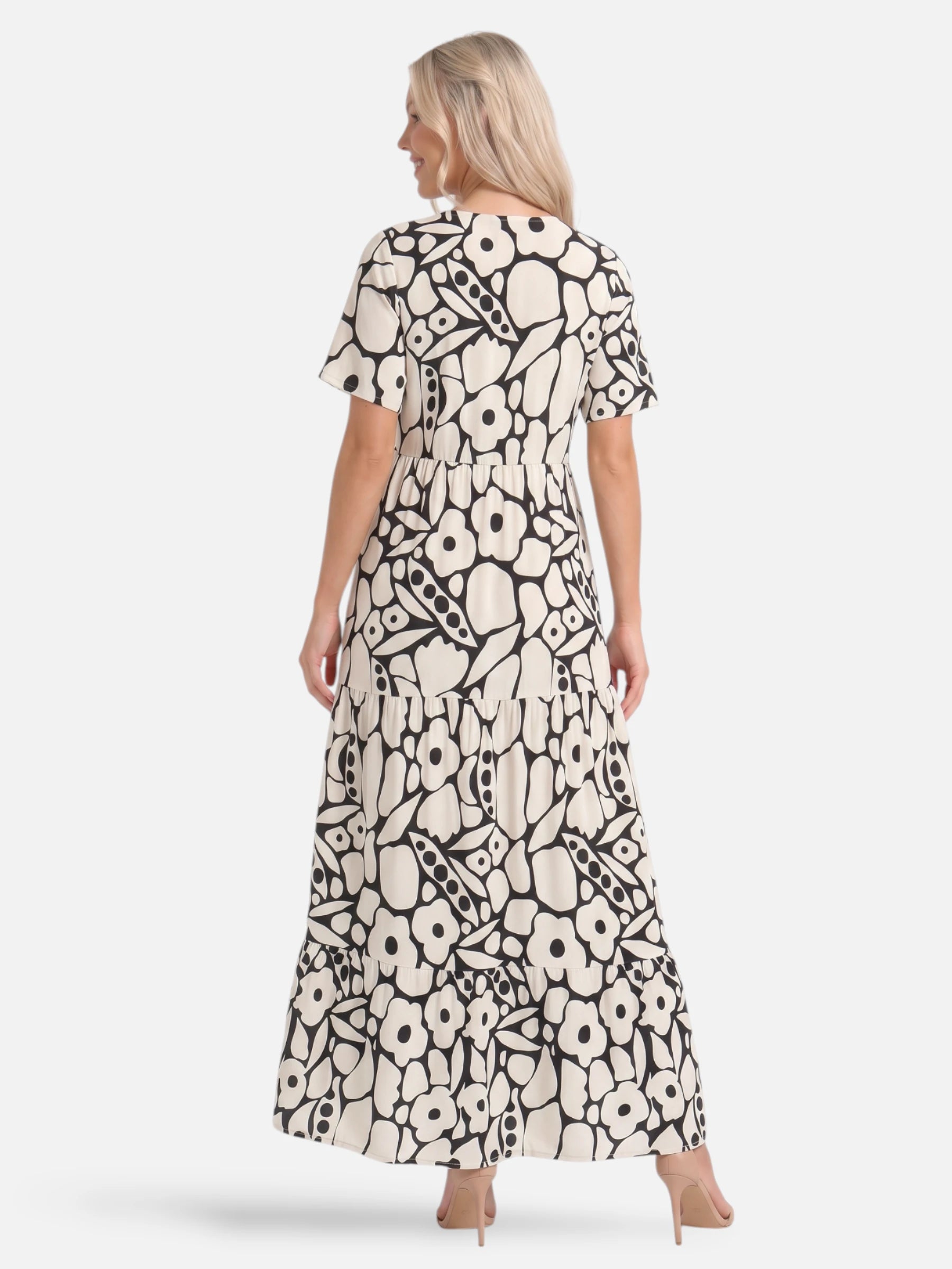 Robe longue fleurie col V – imprimé rétro et coupe volantée