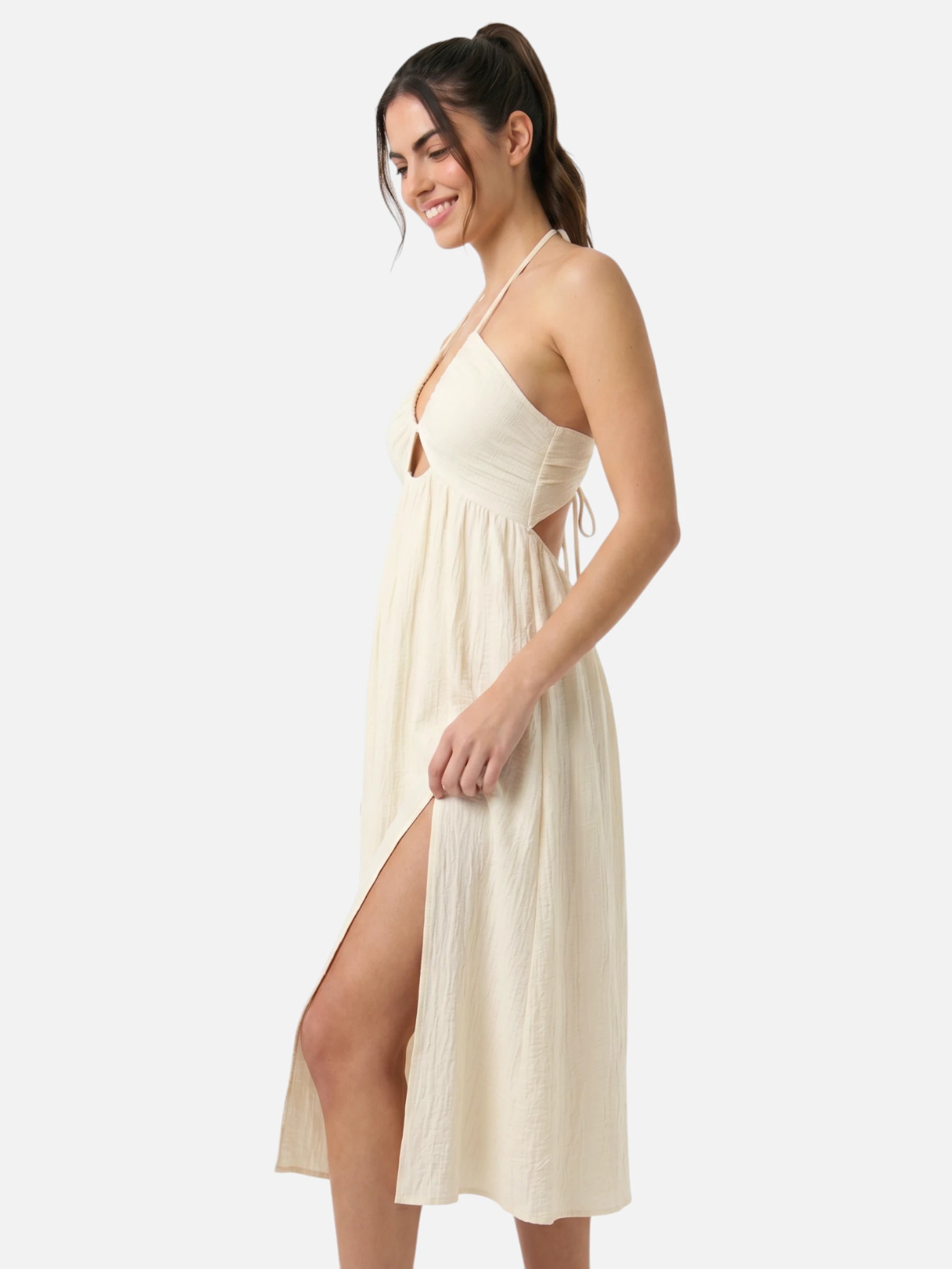 Robe midi halter écrue dos nu à découpes et fente latérale