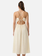 Robe midi halter écrue dos nu à découpes et fente latérale