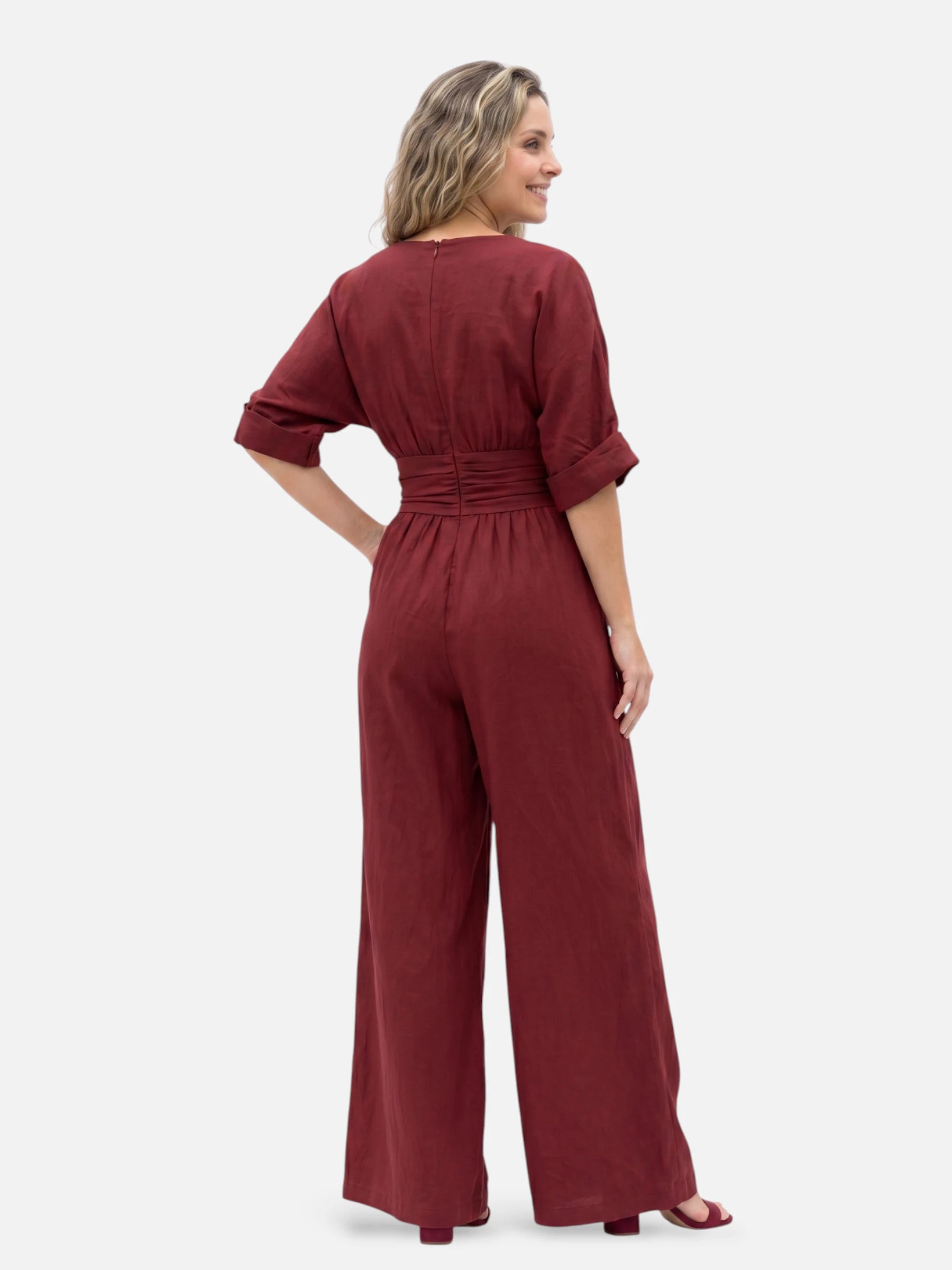 Combinaison élégante à jambes larges et col cache-cœur pour femme